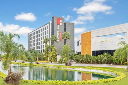 an artist rendering of the planned headquarters of the company at Fiesta Inn Express Cancún Cumbres in Cancún