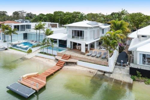 an aerial view of a house on the water at Lucy - Noosa - Noosaville in Noosaville
