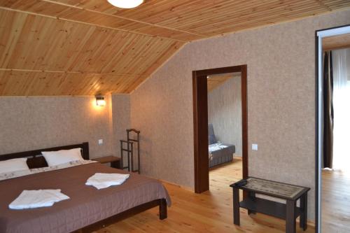 Postel nebo postele na pokoji v ubytování Bilovoddya Hotel