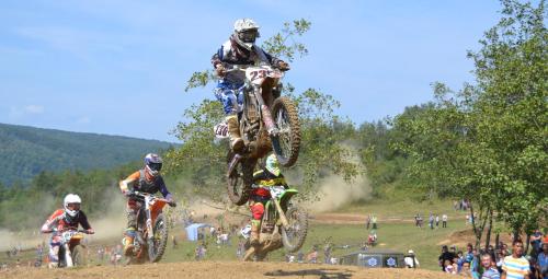 a group of people riding dirt bikes in the air at Bilovoddya Hotel in Sil'