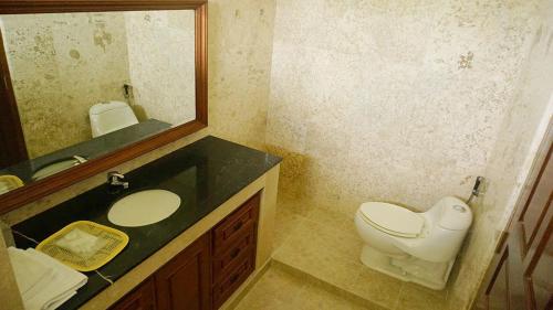 Ванная комната в Devega Homestay