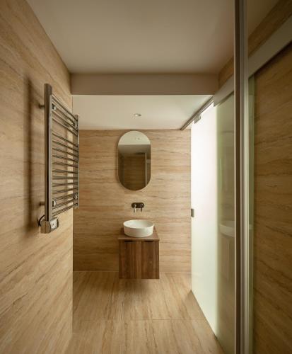 a bathroom with a sink and a mirror at The Republic Boutique Hotel in Valletta