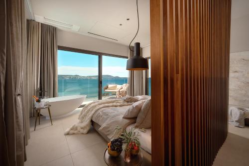 Beachfront Villa Malia near Trogir with Heated Pool & Jacuzzi