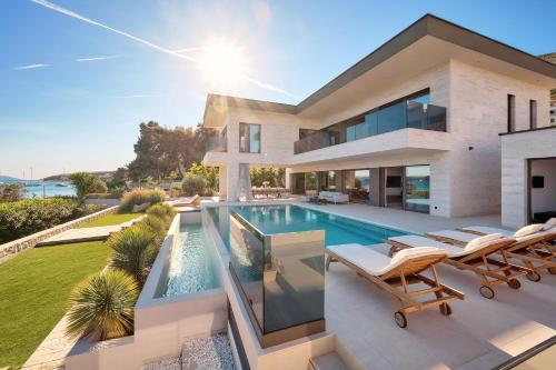 Beachfront Villa Malia near Trogir with Heated Pool & Jacuzzi