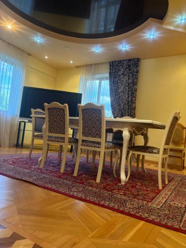 a dining room with a table and chairs at BEAUTI-House in Ijevan