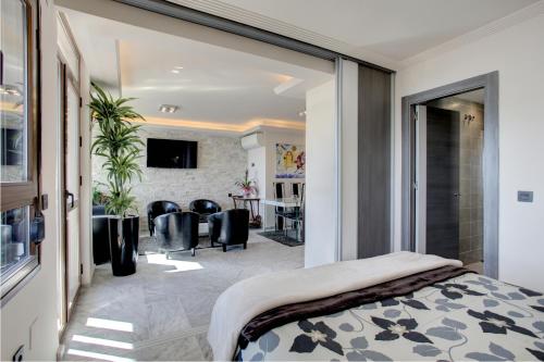a bedroom with a view of a living room at New Luxury Premium in Málaga