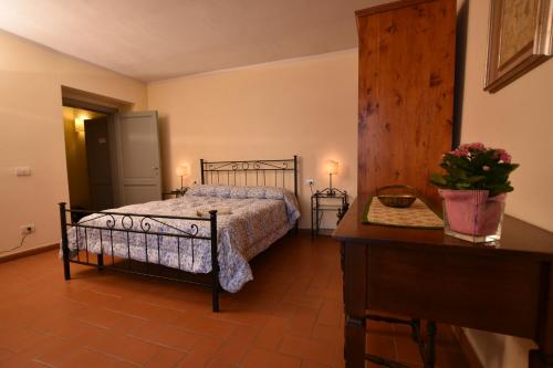 Cama o camas de una habitación en Rimaggiori Country Home & Restaurant