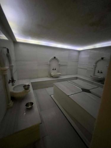 a bathroom with a sink and two sinks in it at Mountains and sea in Boghaz