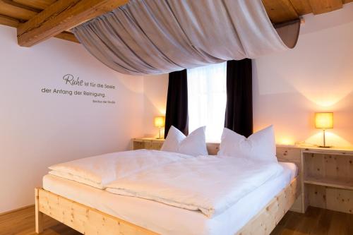 Ένα ή περισσότερα κρεβάτια σε δωμάτιο στο himmlisch urlauben St. Nikolai