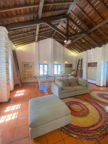 a living room with a couch and a table at Casa Merino in Évora