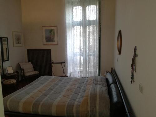 A bed or beds in a room at In Via Roma