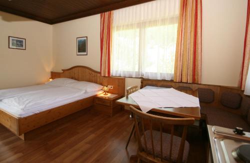 Postel nebo postele na pokoji v ubytování Ahlhof