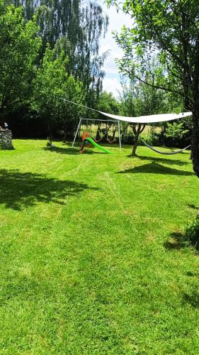 a field with a goal in the middle of a park at AMA Bliss Nature & Cozy Cabin in Avrig