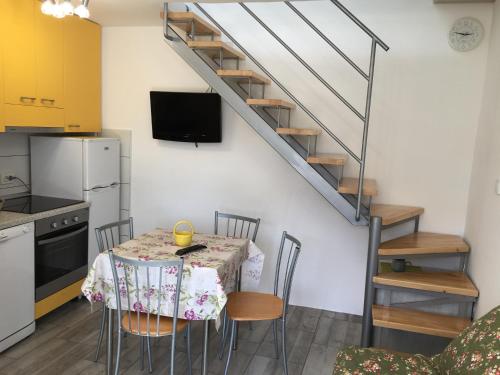 Kuchyň nebo kuchyňský kout v ubytování House Mima