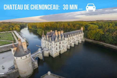 an aerial view of a castle in the water at Caporizon - La Solognote in Bracieux