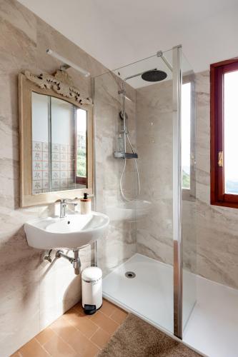 a bathroom with a sink and a shower at Allegria in Baiardo