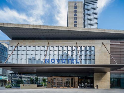a building with a no motor sign on it at Novotel Wuxi in Wuxi