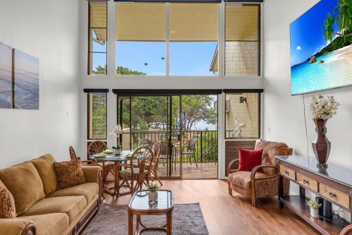 a living room with a couch and a table at Makani A Kai B11 in Wailuku