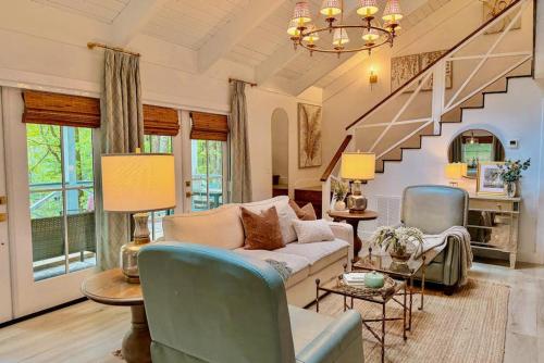 a living room with a couch and chairs at Dragonfly Cabin in Scaly Mountain