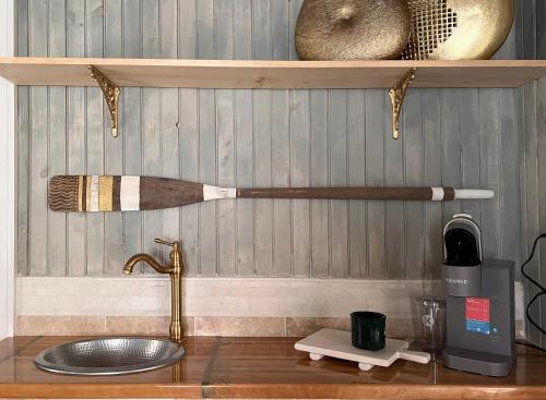 a kitchen counter top with a sink and a mixer at Frederick William House in Falmouth