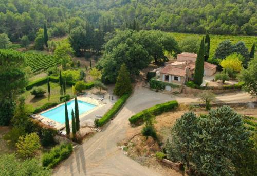 an aerial view of a estate with a swimming pool at Bastide de Fave in Brue-Auriac