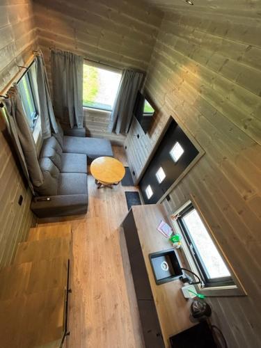 an overhead view of a living room in a tiny house at Bjørgo Gard - Stegastein in Aurland