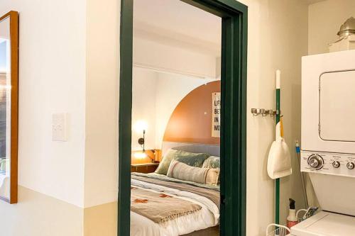 a mirror in a room with a bed at Sunset Sanctuary in Steamboat Springs