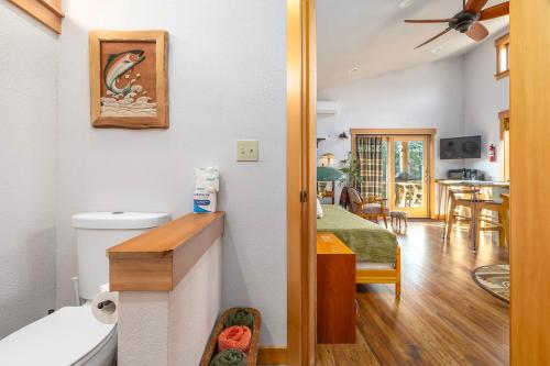 a room with a bathroom and a living room at Little Big Fish | Wifi, BBQ, AC ,Rainier View in Packwood