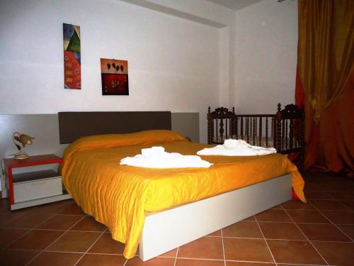 מיטה או מיטות בחדר ב-Ciuscia