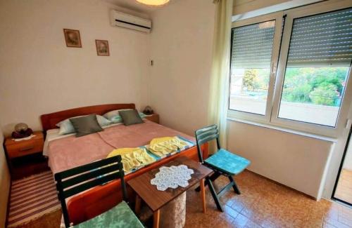 Apartments with parking space Barbat, Rab - 27424