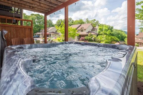 a hot tub in the backyard of a house at Gulfway Hideaway in Oakland