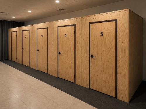 a row of wooden lockers in a room at The Cozy Cube in Rawalpindi