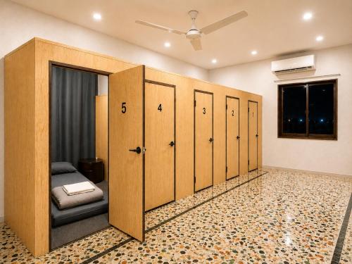 a row of lockers in a locker room at The Cozy Cube in Rawalpindi