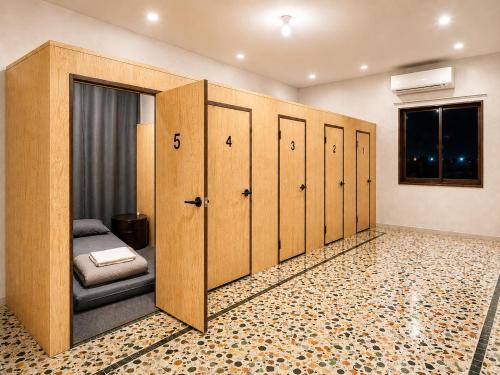 a row of lockers in a locker room at The Woodbox Hostel in Rawalpindi