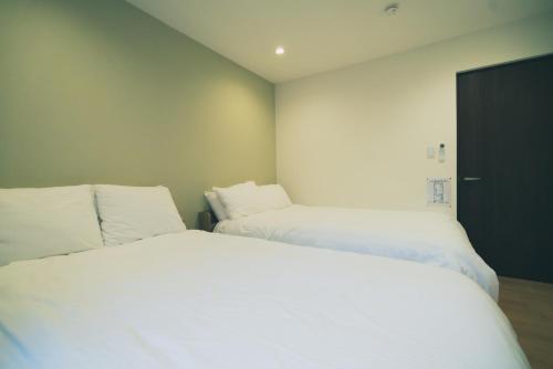 OHARA INN Japanese-style residence surrounded by gardens Tatami mats and scenic bath Convenient location near three subway lines