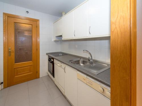 Kuchyň nebo kuchyňský kout v ubytování Gestión de Alojamientos Apartments