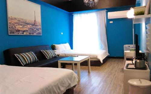 Кровать или кровати в номере Summer Kenting B&B