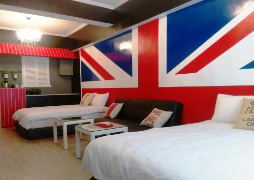 Lova arba lovos apgyvendinimo įstaigoje Summer Kenting B&B