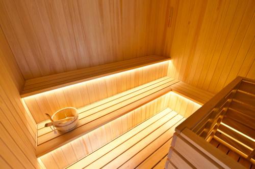 a inside of a sauna with a bowl and a cup at 樂 Gou in Ise