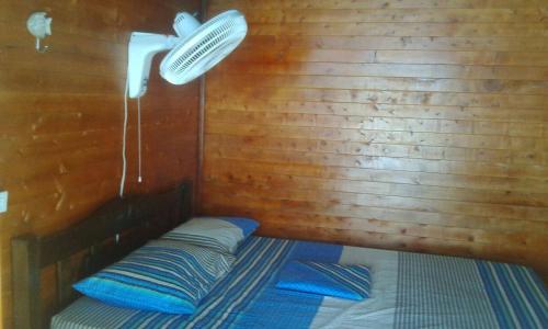 Voodi või voodid majutusasutuse Cabaña Luna Azul toas
