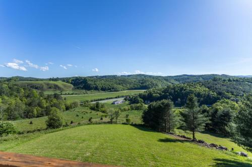an open field with a river in the distance at Buena Vista in Todd