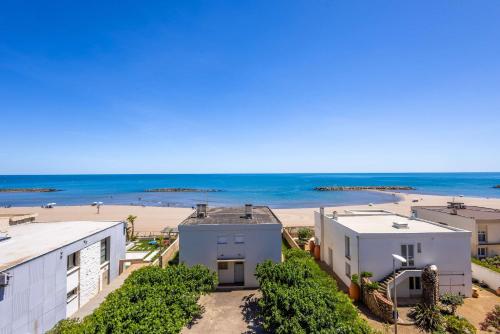 an aerial view of the beach and buildings at Valras'Loc - Evasion Marine in Valras-Plage