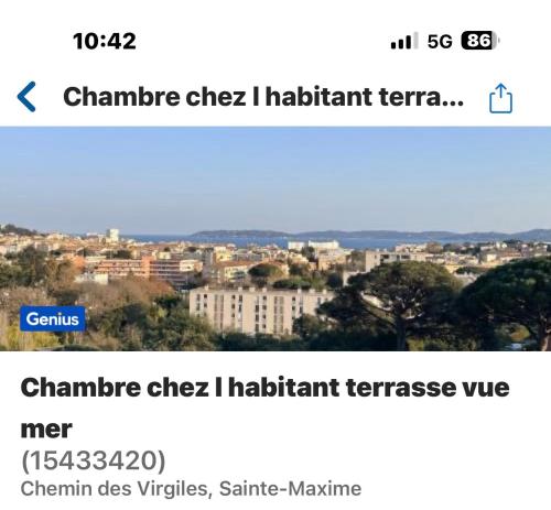 a screenshot of a cell phone with a picture of a city at Chambre chez l habitant terrasse vue mer in Sainte-Maxime
