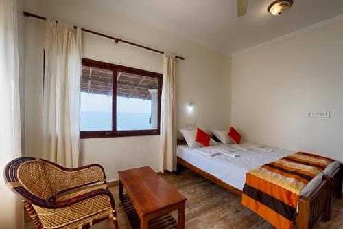 Ένα ή περισσότερα κρεβάτια σε δωμάτιο στο Cherai Onetree Retreat