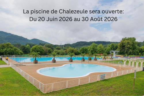 a swimming pool at a resort with the words la prestige de chatelev spa at Camping Onlycamp de Besançon in Chalezeule