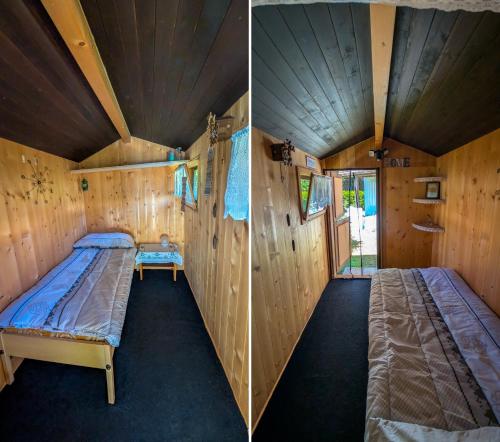 a room with a bed in a wooden house at Gemütliches Gartenhüttli mit Alpenblick in Meiringen