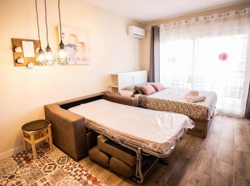 Bella Aura Acogedor Estudio con Terraza en el Centro