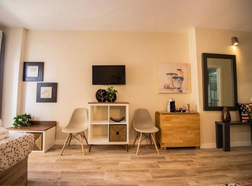 Bella Aura Acogedor Estudio con Terraza en el Centro