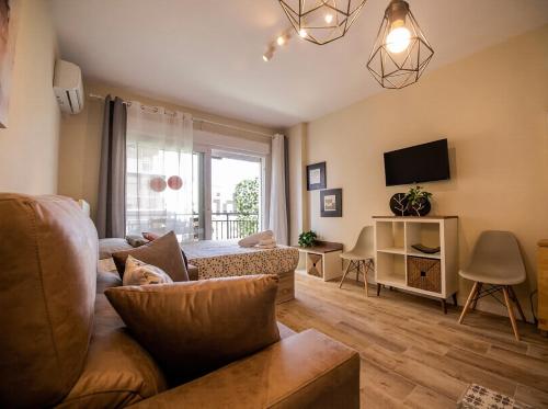 Bella Aura Acogedor Estudio con Terraza en el Centro