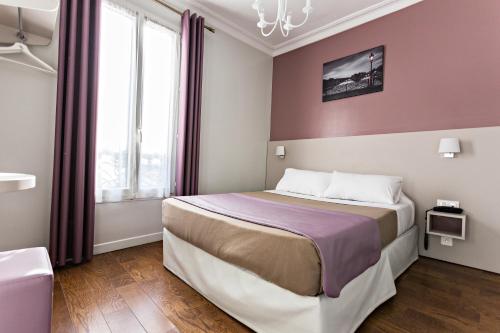 Katil atau katil-katil dalam bilik di Modern Hotel